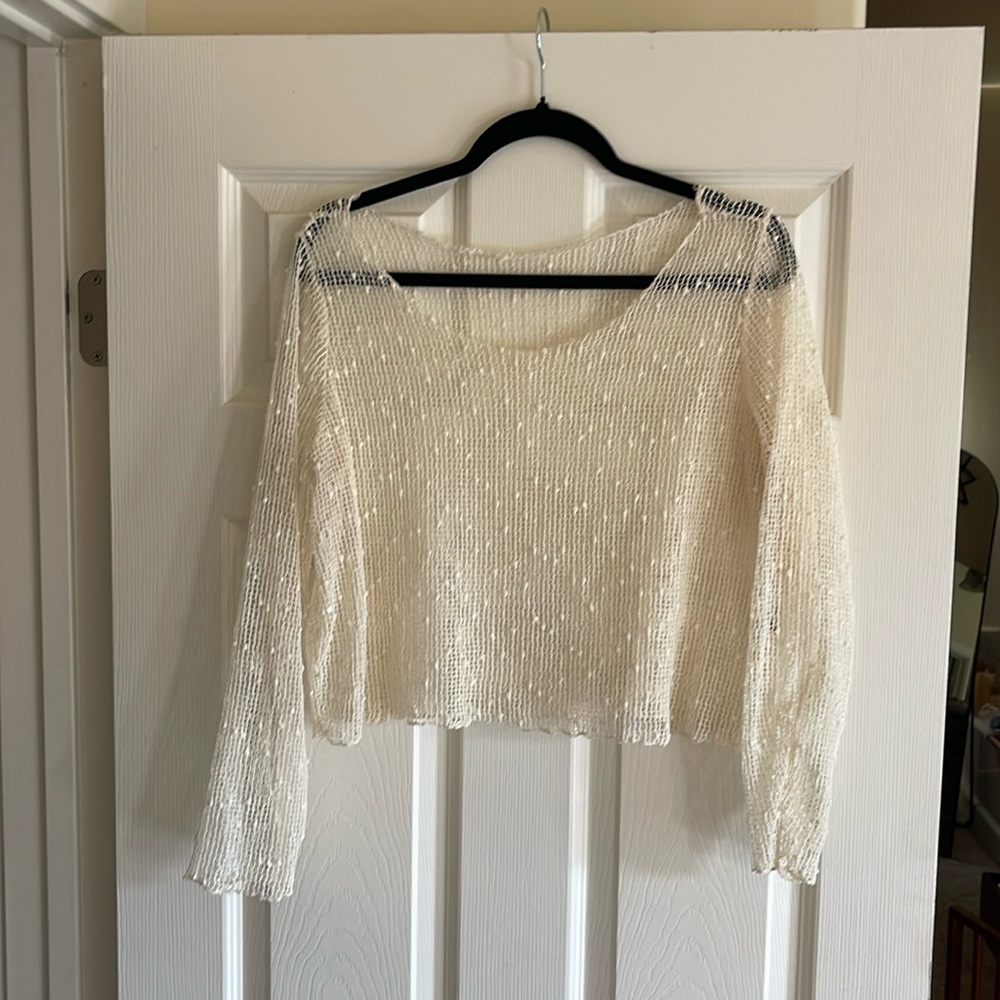 Large, long sleeve, see-through top